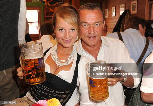 Actress Lara-Joy Koerner and her husband Heiner Pollert attend the Oktoberfest beer festival at Schuetzenzelt beer tent on September 17, 2011 in...