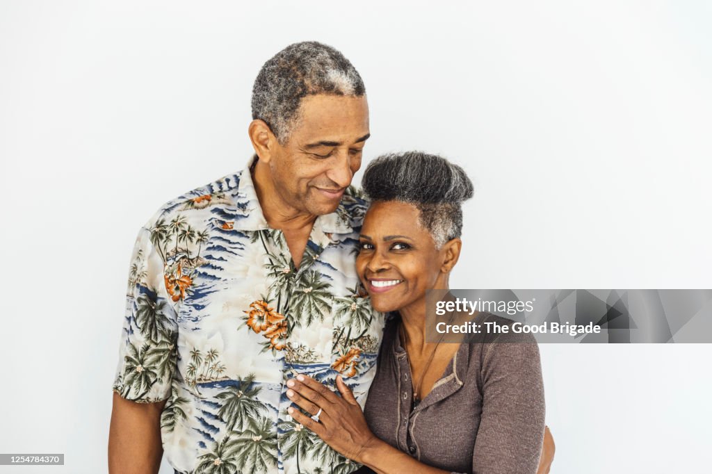 Happy couple on white background