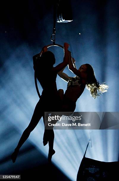 Artists perform at an after party celebrating Roberto Cavalli's new Sloane Street boutique at Battersea Power Station on September 17, 2011 in...