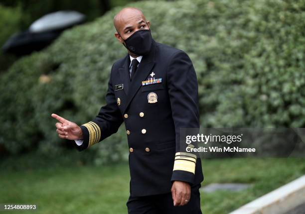 Surgeon General Jerome Adams walks to the West Wing of the White House after a television interview July 7, 2020 in Washington, DC. Adams recently...