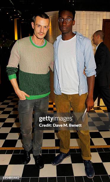 Jonathan Saunders and Nathan Stewart-Jarrett attend an aftershow party following Jonathan Saunders Spring/Summer 2012 catwalk show during London...