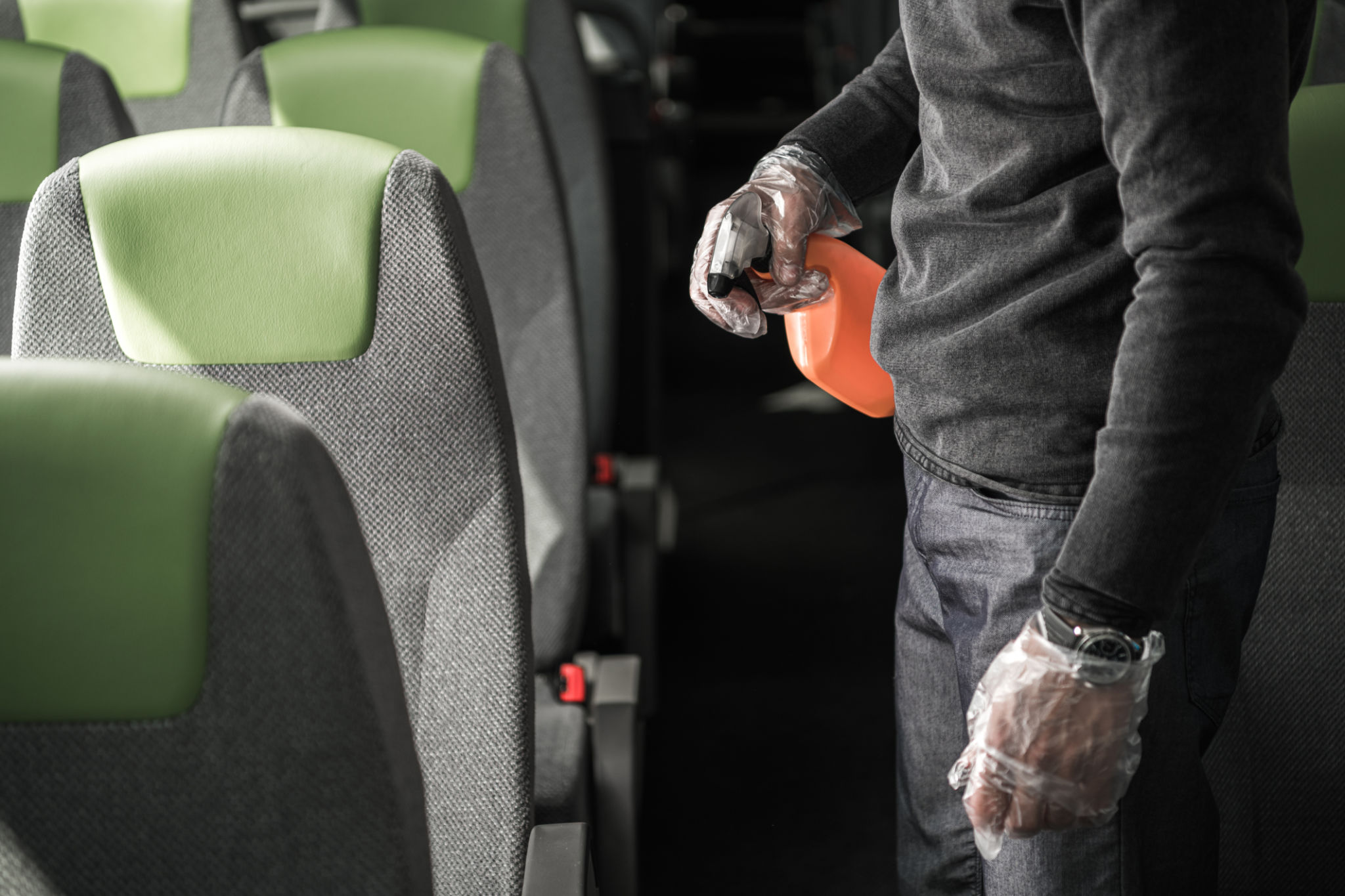 Sanitizing Procedure Inside Of Intercity Coach Bus. Sanitizing Procedure Inside Of Intercity Coach Bus.