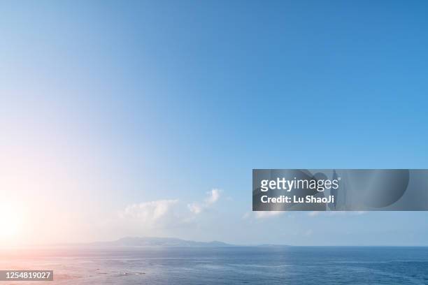 azure ocean with blue sky in okinawa japan. - sea clear sky stock pictures, royalty-free photos & images