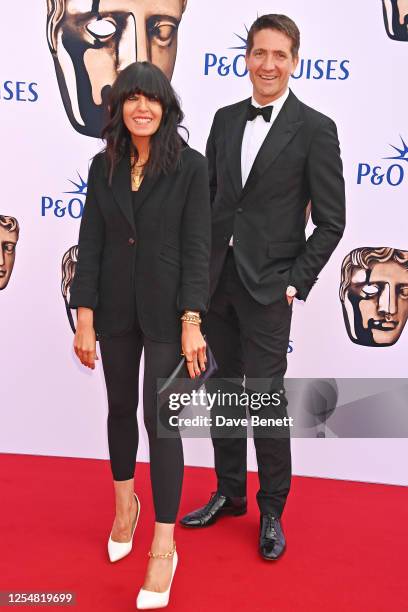 Claudia Winkleman and Kris Thykier arrive at the 2023 BAFTA Television Awards with P&O Cruises at The Royal Festival Hall on May 14, 2023 in London,...