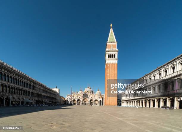 the san marco square in the heart of venice, itlay. - saint mark stock pictures, royalty-free photos & images