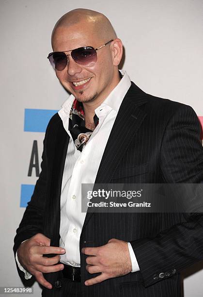 Rapper Pitbull poses in the press room during the 2010 American Music Awards held at Nokia Theatre L.A. Live on November 21, 2010 in Los Angeles,...