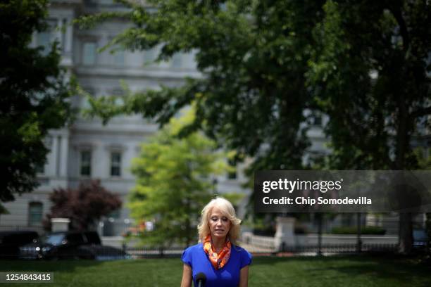 Kellyanne Conway, counselor to President Donald Trump, talks to reporters following an interview with FOX outside the White House West Wing July 07,...