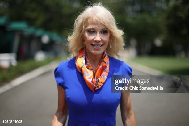 Kellyanne Conway, counselor to President Donald Trump, walks back into the West Wing following an interview with FOX outside the White House July 07,...