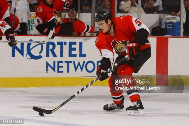 Sami Salo of the Ottawa Senators skates with the puck during a NHL hockey game against the Washington Capitals at MCI Center on November 13, 2001 in...