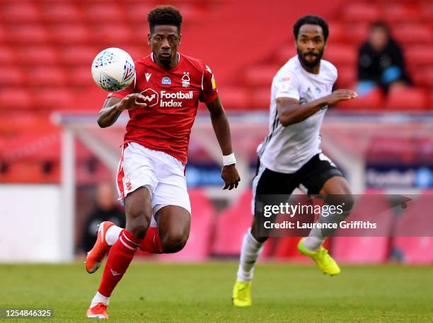 Nuno Da Costa of Nottingham Forest is challenged Michael Hector of Fulham by during the Sky Bet Championship match between Nottingham Forest and...