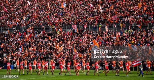 Monaghan , Ireland - 14 May 2023; Armagh and Derry players parade before the Ulster GAA Football Senior Championship Final match between Armagh and...