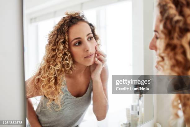 are you happy with the woman staring back at you? - mirror imagens e fotografias de stock