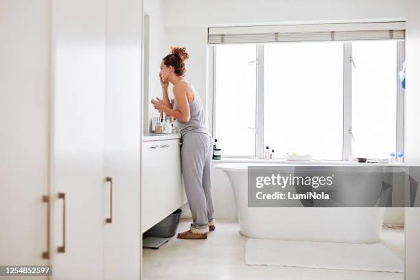 give yourself the best version of you - woman-looking-into-mirror-full-body stock pictures, royalty-free photos & images