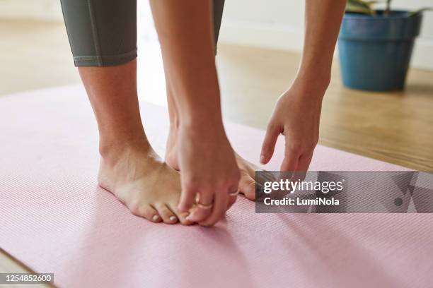 take it to the tips of your toes - touching toes stock pictures, royalty-free photos & images