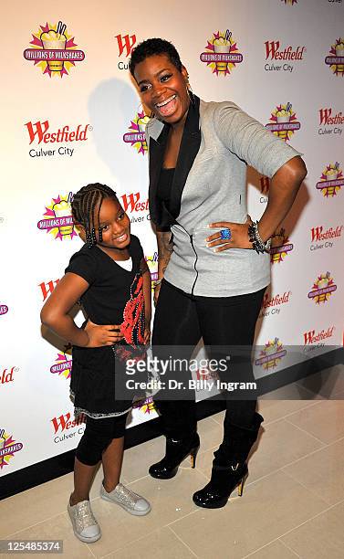 Singer Fantasia and her daughter Zion Barrino attend the unveiling of her favorite shake at Millions of Milkshakes on November 24, 2010 in Culver...