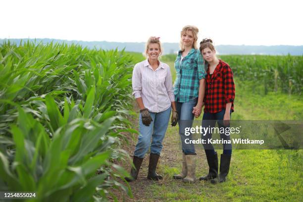 three generations of female farmers. - iowa family stock pictures, royalty-free photos & images