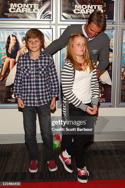 Shane Warne along with his daughter Brooke Warne and son Jackson Warne arrive at the Melbourne Premiere of 'Monte Carlo' at Hoyts Cinemas Melbourne...