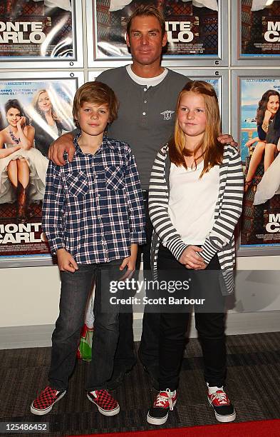 Shane Warne along with his daughter Brooke Warne and son Jackson Warne arrive at the Melbourne Premiere of 'Monte Carlo' at Hoyts Cinemas Melbourne...