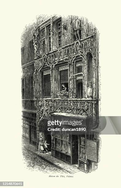 ornate 16th century facade of maison des tetes, valence, france - façade maison stock illustrations