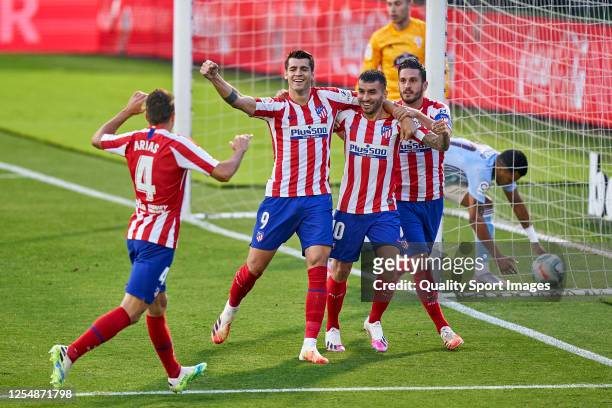 Alvaro Morata of Atletico de Madrid celebrates with his team mates after scoring his team's first goal during the Liga match between RC Celta de Vigo...