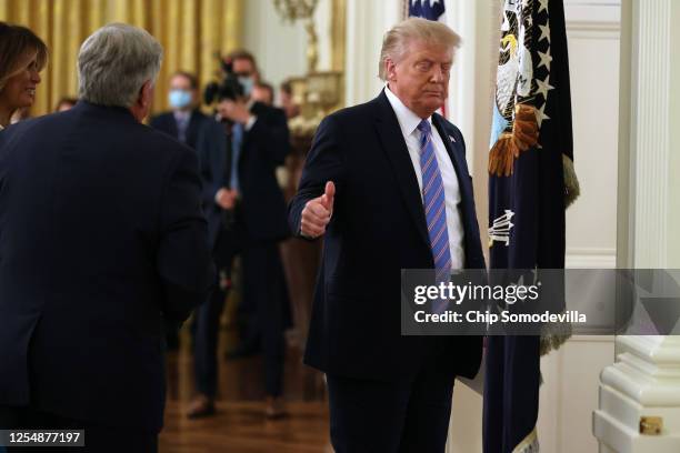 President Donald Trump meets gives a thumbs-up as he leaves a meeting with students, teachers and administrators about how to safely re-open schools...