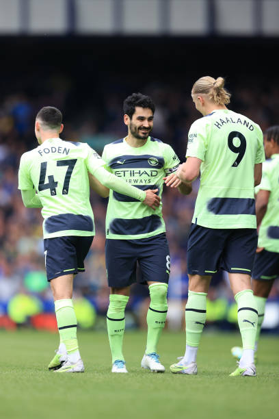 Ilkay Gundogan of Manchester City celebrates with Phil Foden of Manchester City and Erling Haaland of Manchester City after scoring their 3rd goal...