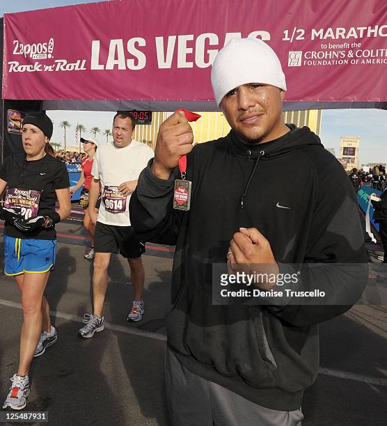Fernando Vargas crosses the finish line at Zappos.com Rock 'n' Roll Las Vegas Marathon and Half-Marathon to benefit the Chron's and Colitis...