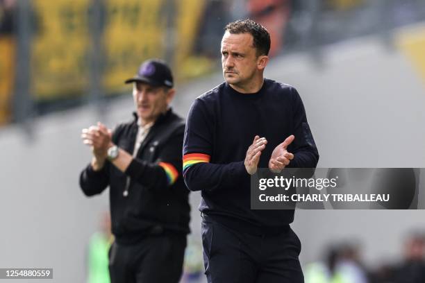 Nantes' head coach Pierre Aristouy and Toulouse's French head coach Philippe Montanier gesture during the French L1 football match between Toulouse...