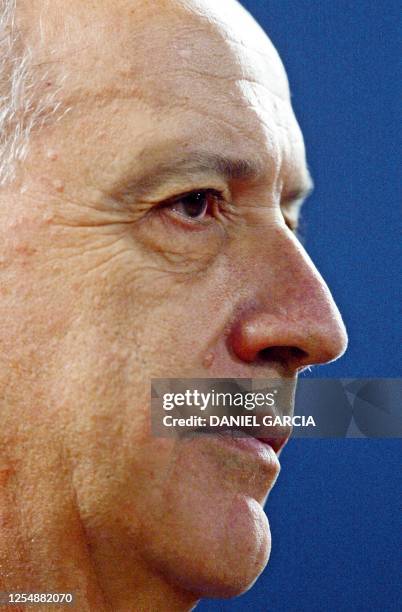 Newly named Argentine Economy Minister Roberto Lavagna listens during his first press conference 27 April, 2002 in Buenos Aires. Lavagna was named 26...