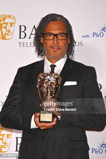 David Olusoga poses in the Winner's Room at the 2023 BAFTA Television Awards with P&O Cruises at The Royal Festival Hall on May 14, 2023 in London,...