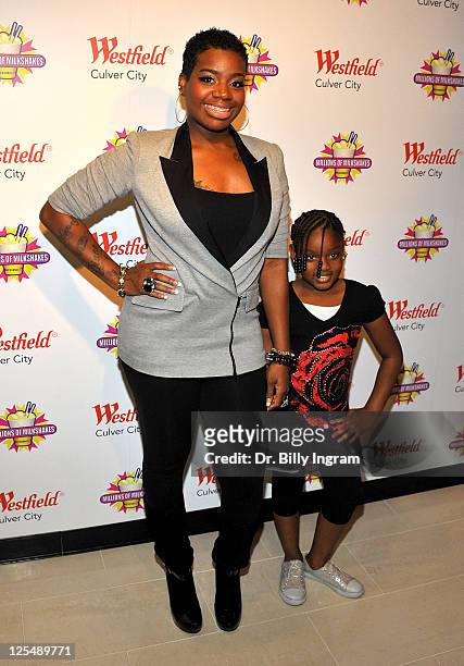 Singer Fantasia and her daughter Zion Barrino attend the unveiling of her favorite shake at Millions of Milkshakes on November 24, 2010 in Culver...