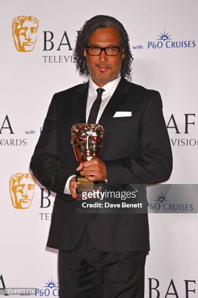 David Olusoga, winner of the Special Award, poses in the Winner's Room at the 2023 BAFTA Television Awards with P&O Cruises at The Royal Festival...