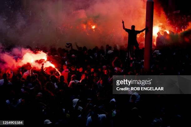 Feyenoord fans celebrate their club's victory after the Dutch Eredivisie football match between Feyenoord and Go Ahead Eagles at the Stadium De Kuip...