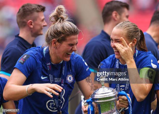 Millie Bright and Magdalena Eriksson of Chelsea celebrate with the trophy after the Vitality Women's FA Cup Final between Chelsea and Manchester...