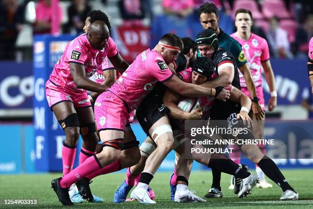 Stade Francais' French lock Paul Gabrillagues vies with Lyon's Fijian hooker Temo Mayanavanua during the French Top14 rugby union match between Stade...