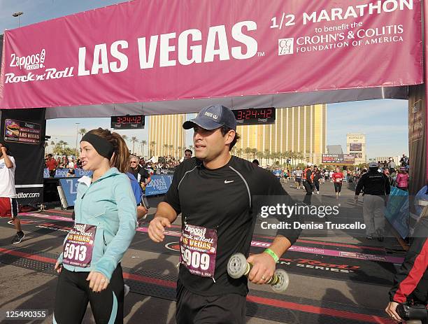 Molly Mesnick and Jason Mesnick at the finish line at Zappos.com Rock 'n' Roll Las Vegas Marathon and Half-Marathon to benefit the Chron's and...