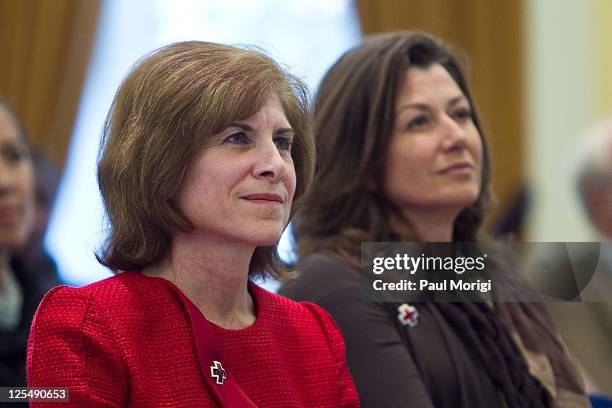 Gail McGovern, President and CEO, American Red Cross, and singer/songwriter Amy Grant attend the 2010 Holiday Mail for Heroes program launch at the...