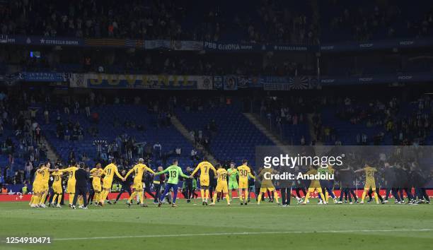 Players of Barcelona celebrate their victory at the end of the Spanish league football match between RCD Espanyol vs FC Barcelona at the Cornella-El...