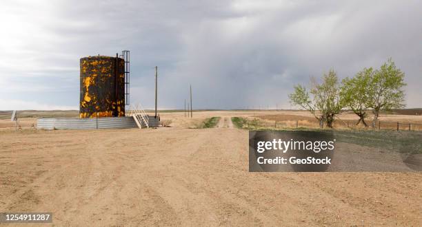 a rusted oil storage tank - fuel storage tank staircase stock pictures, royalty-free photos & images