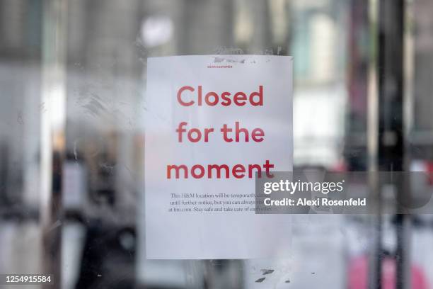 Closed for the moment' sign is displayed on the H&M store in Herald Square as the city moves into Phase 3 of re-opening following restrictions...