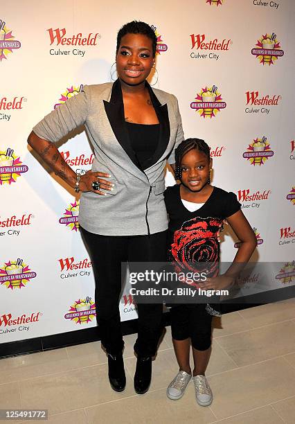 Singer Fantasia and her daughter Zion Barrino attend the unveiling of her favorite shake at Millions of Milkshakes on November 24, 2010 in Culver...