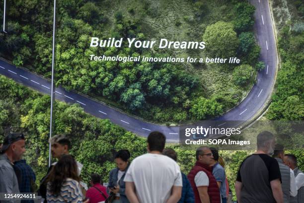 The advertising slogan of the Chinese multinational BYD Co Ltd is seen at the Automobile Barcelona show. The Automobile Barcelona 2023 show opens its...