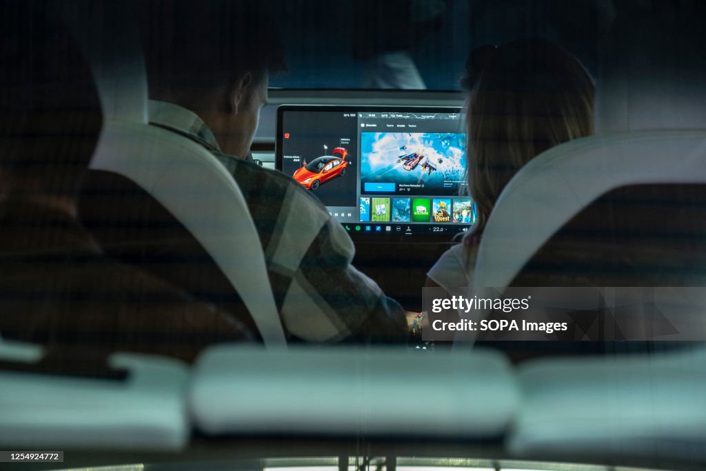 The interior of a Tesla vehicle is seen at the Automobile...