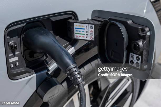 Car in an electric charge situation is seen at the Automobile Barcelona show. The Automobile Barcelona 2023 show opens its doors from May 13 to 21 at...