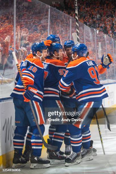 Connor McDavid of the Edmonton Oilers celebrates his first period goal against the Vegas Golden Knights with Zach Hyman, Evander Kane, Brett Kulak...