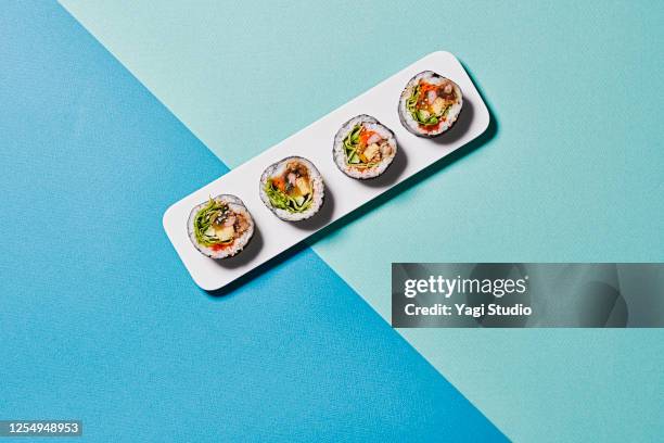 colorful color scheme background and korean gimbap - sushi stock pictures, royalty-free photos & images