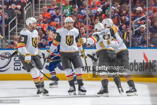 Jonathan Marchessault of the Vegas Golden Knights celebrates after his second period goal against the Edmonton Oilers with Brayden McNabb, Ivan...