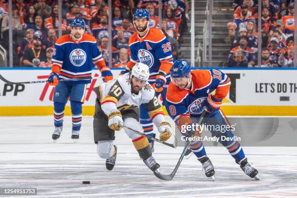 Derek Ryan of the Edmonton Oilers skates against Chandler Stephenson of the Vegas Golden Knights in Game Six of the Second Round of the 2023 Stanley...