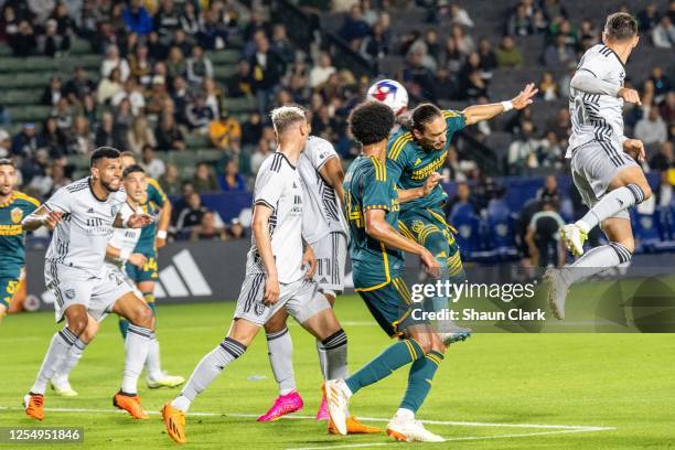 Martín Cáceres of Los Angeles Galaxy scores a header during the match against San Jose Earthquakes at Dignity Health Sports Park on May 14, 2023 in...