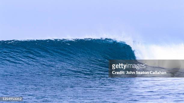 indonesia, ocean wave in the hinako islands - hinako islands stock pictures, royalty-free photos & images